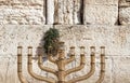 The huge traditional and state-owned menorah in the Western Wall plaza in Jerusalem,