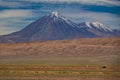 Huge volcano with snow covered peak