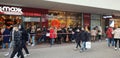 Huge waiting lines at stores in times of Corona Covid-19 pandemic - SAARBRUECKEN, GERMANY - DECEMBER 05, 2020