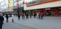 Huge waiting lines at stores in times of Corona Covid-19 pandemic - SAARBRUECKEN, GERMANY - DECEMBER 05, 2020