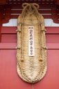 The huge Waraji sandal atop the Hozomon Gate. Sensoji Kannon temple. Asakusa. Tokyo. Japan