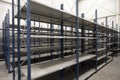 Huge warehouse with empty racks inside for storage modern design, metal shelves for distribution Royalty Free Stock Photo