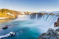 Huge waterfall with rainbows in Iceland