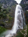 Huge waterfall with hiker