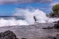 Huge wave splashes on a rocky beach. Royalty Free Stock Photo