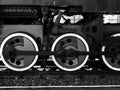 huge wheels of an old train - black and white