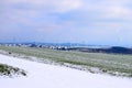 snow covered Eifel with wind power plants