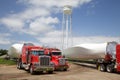 Huge windmill vanes on trucks Royalty Free Stock Photo