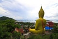 Huge yellow buddha statue