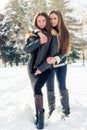 Hugging the best girlfriends in the winter