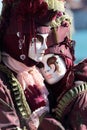 Hugging couple of masks at the Carnival of Venice