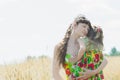 Hugging mother and her little daughter at summer meadow natural background outdoors Royalty Free Stock Photo