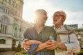 Hugging. Portrait of happy and beautiful senior couple looking at each other and smiling while spending time together Royalty Free Stock Photo