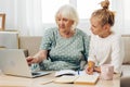 Hugging togetherness granddaughter sofa smiling family grandmother child selfie laptop bonding Royalty Free Stock Photo