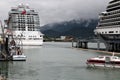 hugh cruise liners with thousands of holiday makers in the harbour of Juneau