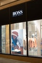 Hugo Boss fashion store, exposition, window shop with modern bags, clothes, shoes from Hugo Boss fashion house Royalty Free Stock Photo