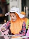 Hui minority female vendor, Sanya, China