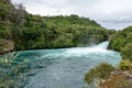 Wide view of Huka Falls flowing into Waikato, Taupo, New Zealand Royalty Free Stock Photo