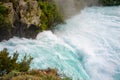 Huka Falls on the Waikata River, Wairakei National Park, New Zealand. Raging torrent flows through rocky, tree lined gorge