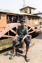 Hularhat, Bangladesh, February 27 2017: A teenager sits in front of The Rocket ship