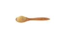 Hulbah powder or Fenugreek flour in wooden spoon isolated on white background, selective focus. Herbal nutritional supplement. Royalty Free Stock Photo