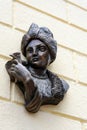 Hulevichivna bronze mini-sculpture on the wall of a building in Kyiv Ukraine