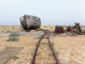 The hull of an abandoned fishing boat on Dungeness beach Royalty Free Stock Photo