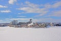 Hull island in white frozen Ottawa river, Gatineau on a sunny day with soft clouds