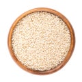 Hulled sesame seeds, white sesame or also benne, in a wooden bowl Royalty Free Stock Photo