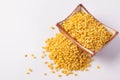 Hulled split mung bean in brown cup on white background Royalty Free Stock Photo