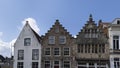 Hulst, The Netherlands, May 1 2021: Old traditional houses in typical Dutch architectural style with stepped gable in a row