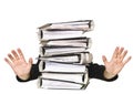 Human behind a stack of Ring Binders