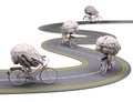 Human brain with arms and legs on bicycle on the road