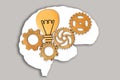 Human Brain with Cogs and Lightbulb on Gray Royalty Free Stock Photo