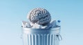 Human Brain with Crumpled Paper and Plastic Bottle in Trash Can, Concept of Mental Clutter AI-generated Royalty Free Stock Photo