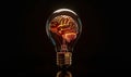 Human brain inside lightbulb on wooden table black background Royalty Free Stock Photo