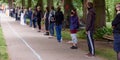 Human chain with social distance at a demonstration during the Corona crisis