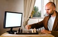 Human chess player against computer