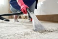 Human Cleaning Carpet In The Living Room Using Vacuum Cleaner At Home Royalty Free Stock Photo