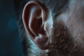 Human ear closeup, male ear macro photo, detailed human auricle anatomy, auditory organ, wiretapping