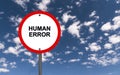 Human error traffic sign on blue sky