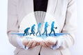 Human evolution / Growth in businesswoman hands Royalty Free Stock Photo
