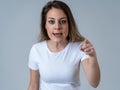 Human expressions and emotions. Desperate young attractive woman with angry face looking furious Royalty Free Stock Photo