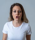 Human expressions and emotions. Desperate young attractive woman with angry face looking furious Royalty Free Stock Photo