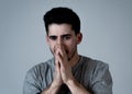 Human expressions, emotions. Young attractive man with sad face, looking depressed and unhappy Royalty Free Stock Photo