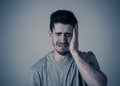 Human expressions, emotions. Young attractive man with sad face, looking depressed and unhappy Royalty Free Stock Photo