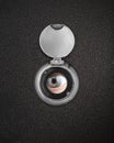 Human eye in peep hole Royalty Free Stock Photo