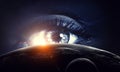 Human eye and space. Elements of this image furnished by NASA.