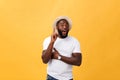 Human face expressions, emotions and feelings. Handsome young African American man looking up with thoughtful and Royalty Free Stock Photo