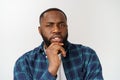 Human face expressions, emotions and feelings. Handsome young African American man looking up with thoughtful and Royalty Free Stock Photo